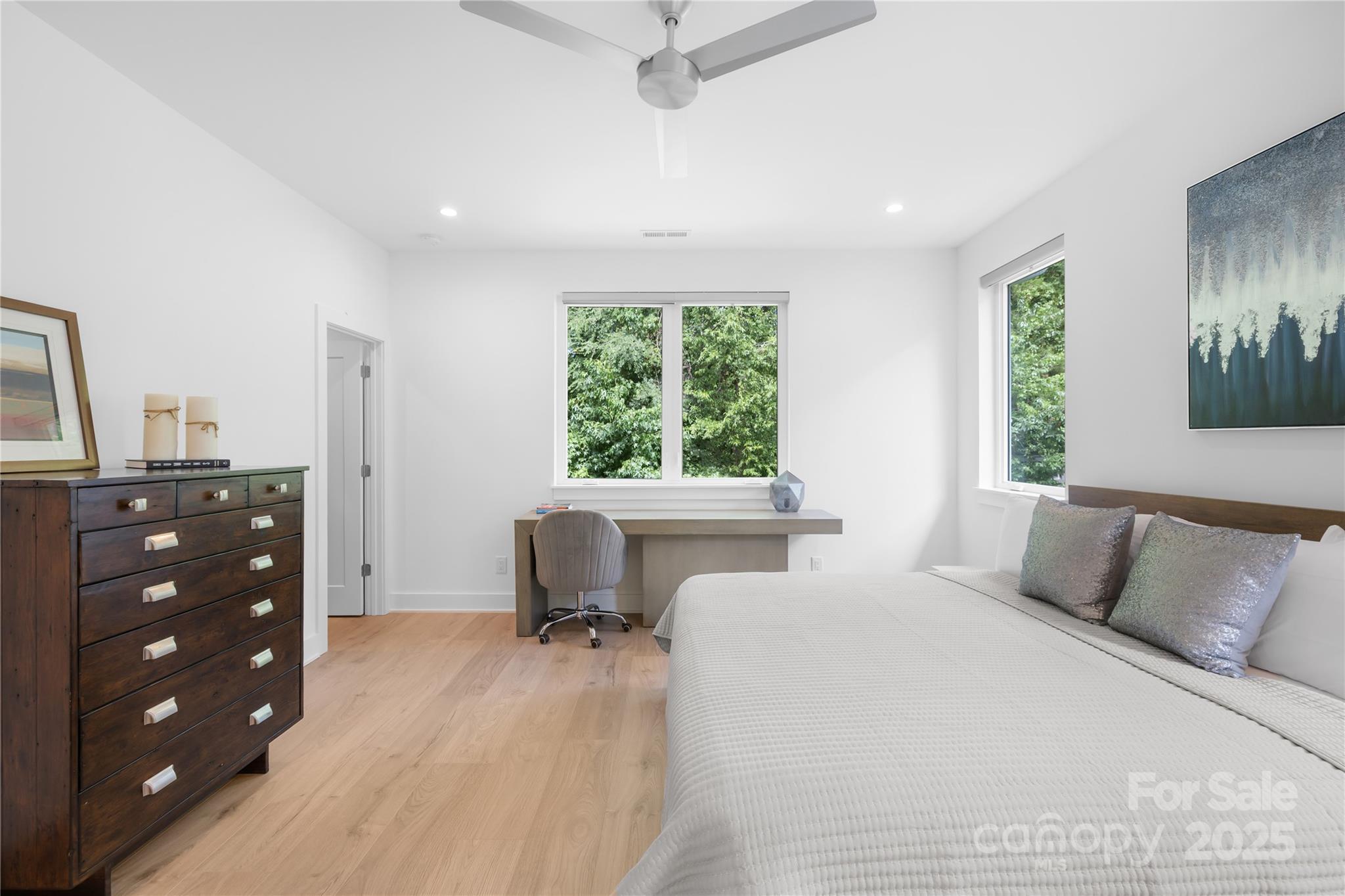 1627 Rama Road Charlotte, NC 28211 - Photo 35 of 43 a bedroom with a bed and a dresser next to a window