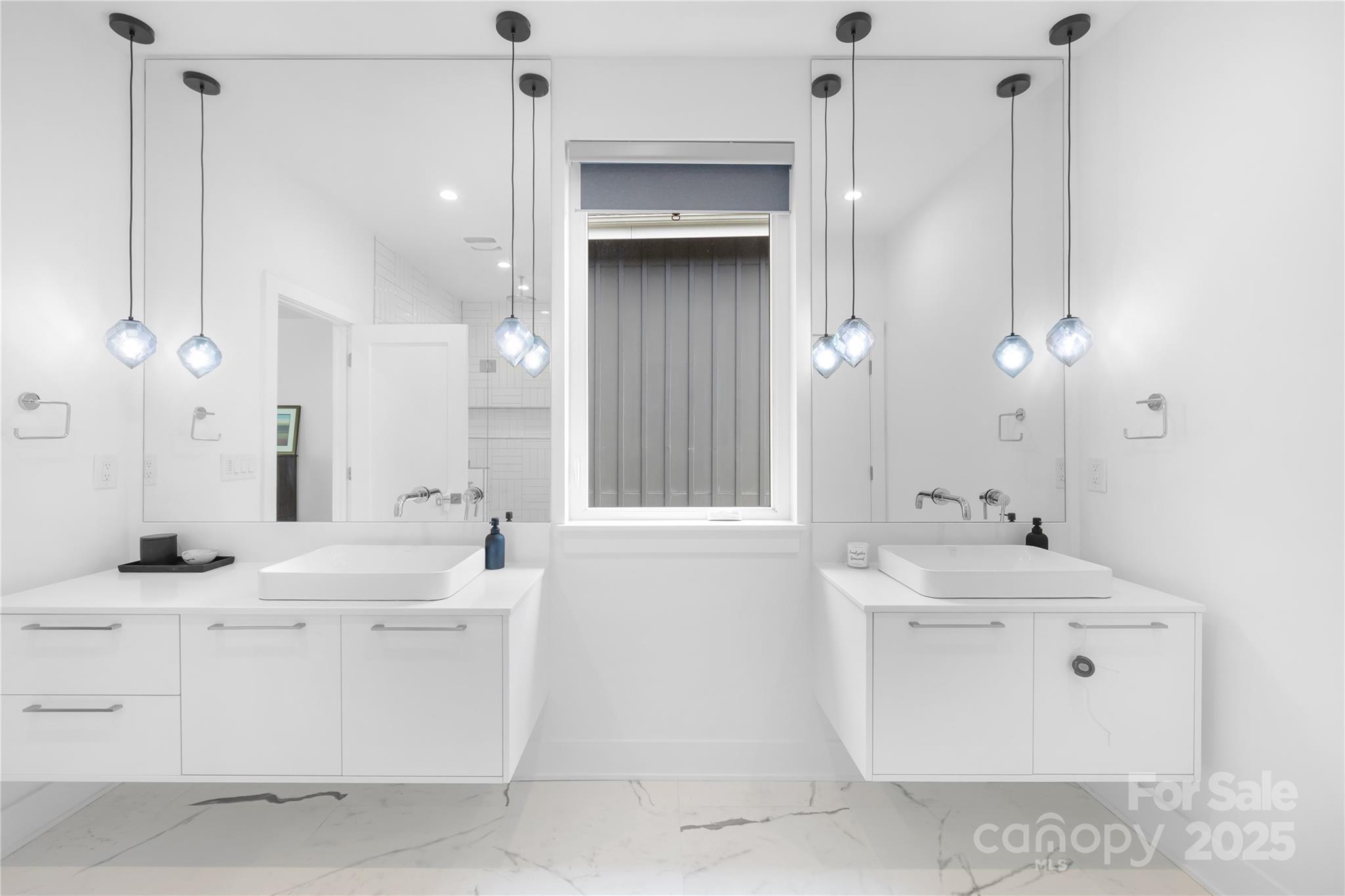 1627 Rama Road Charlotte, NC 28211 - Photo 39 of 43 a bathroom with a sink vanity and a mirror