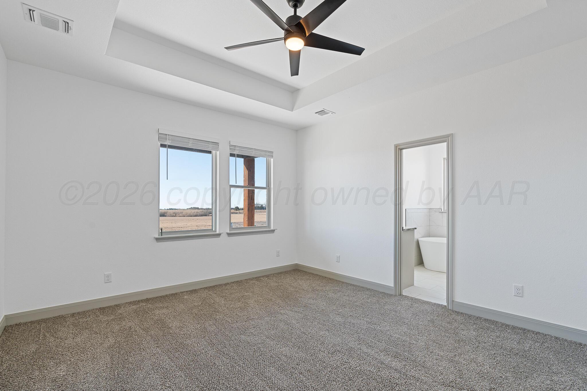 21700 Farm To Market Road 2219 Amarillo, TX 79119 - Photo 16 of 38 a view of an empty room with a window