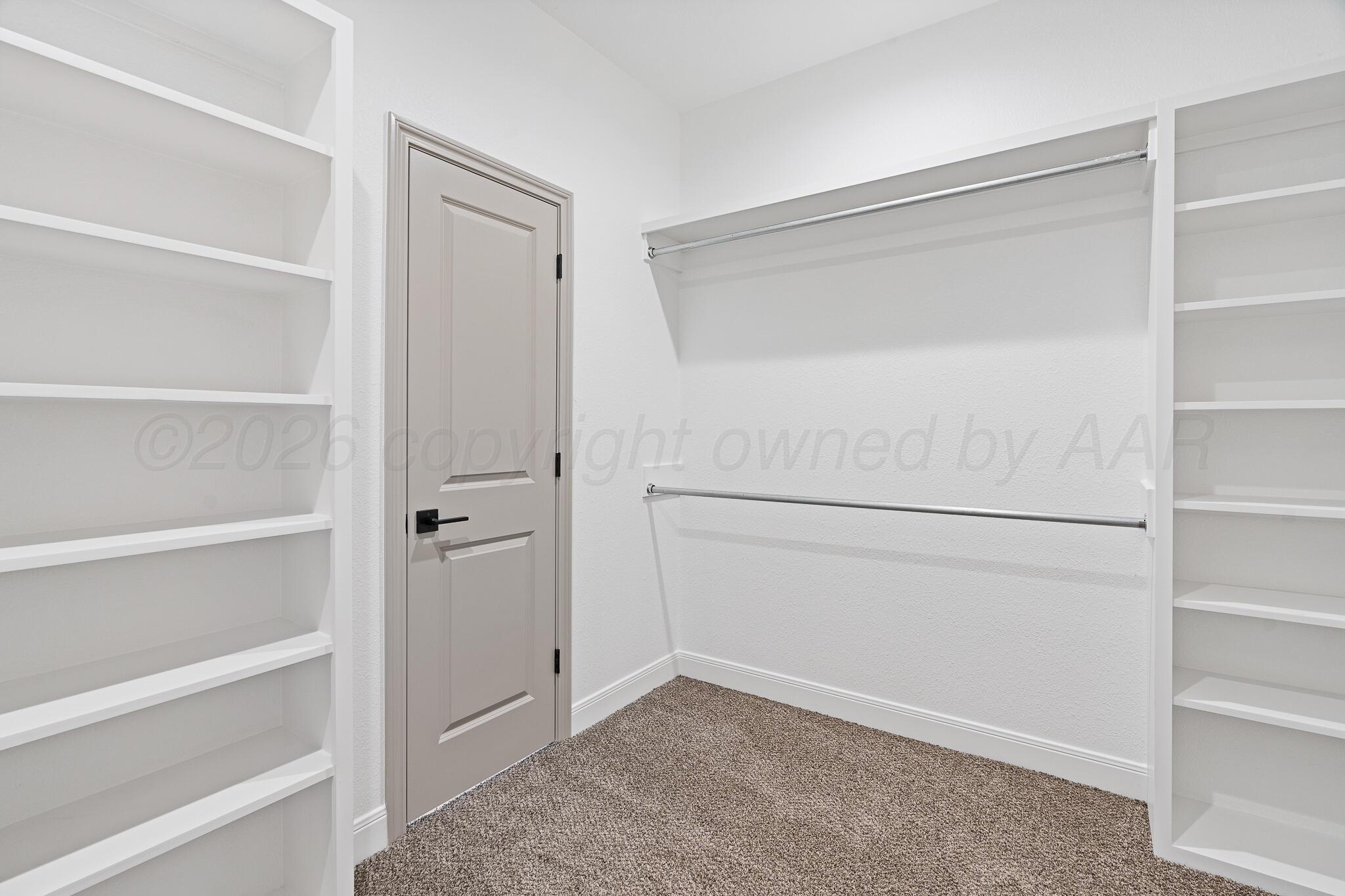 21700 Farm To Market Road 2219 Amarillo, TX 79119 - Photo 17 of 38 a view of an empty walk in closet