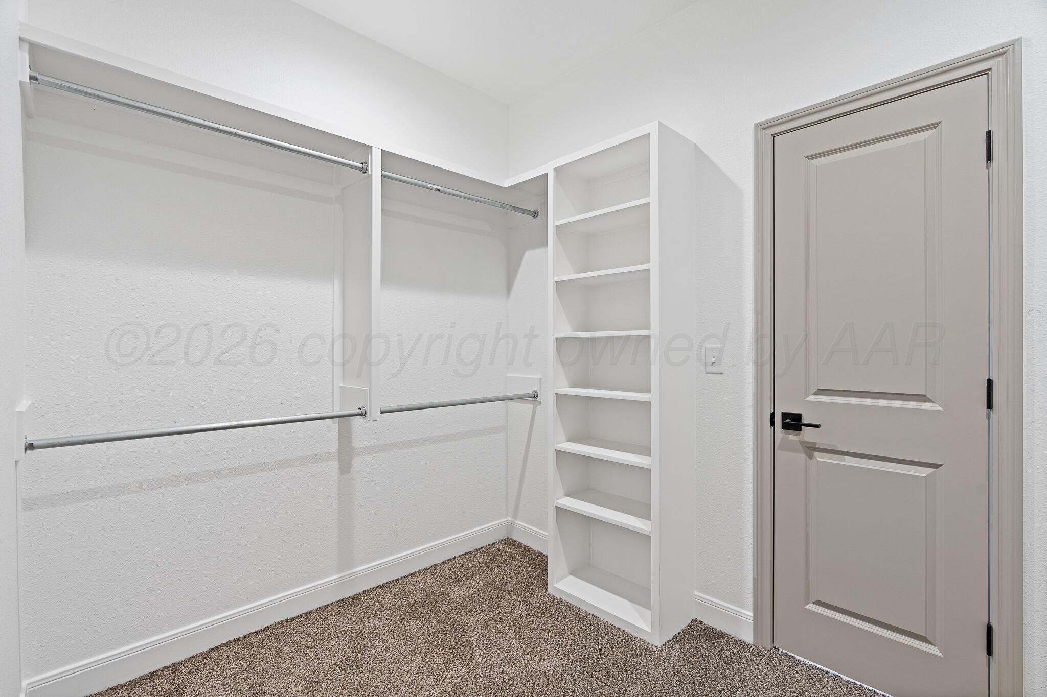 21700 Farm To Market Road 2219 Amarillo, TX 79119 - Photo 18 of 38 a view of an empty walk in closet