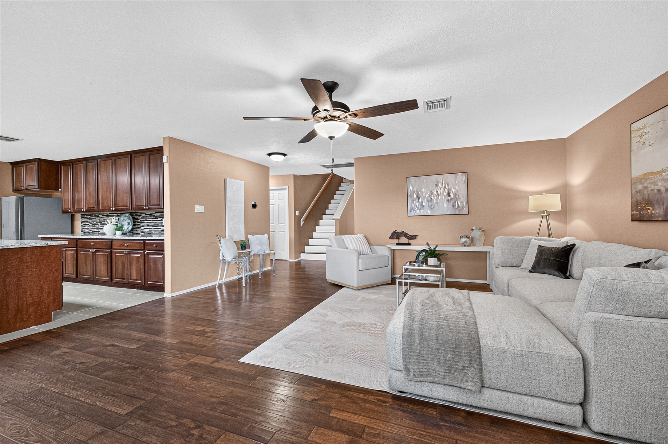 6822 Baron Gate Court Spring, TX 77379 - Photo 14 of 49 Notice the fantastic natural light and gorgeous flooring that carries throughout the space.