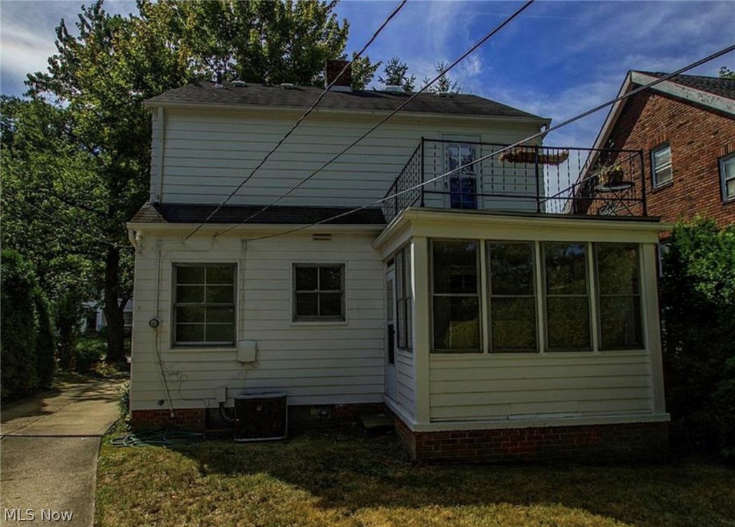 3563 Woodridge Road Cleveland Heights, OH 44121 - Photo 20 of 20 A look at the rear of the property showing the upper deck over the sun room