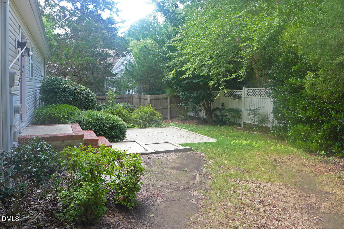 308 Davie Road Carrboro, NC 27510 - Photo 17 of 21 a backyard of a house with lots of green space