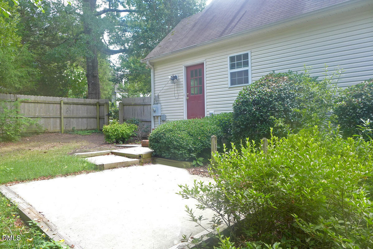 308 Davie Road Carrboro, NC 27510 - Photo 19 of 21 a view of backyard with plants and outdoor seating
