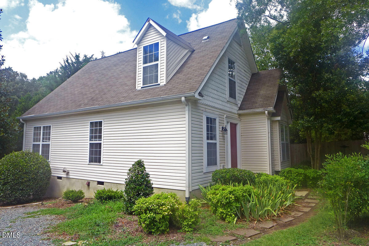 308 Davie Road Carrboro, NC 27510 - Photo 2 of 21 a front view of a house with garden