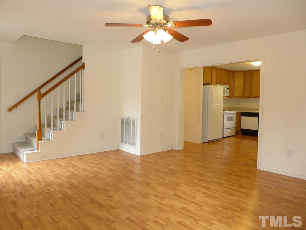 308 Davie Road Carrboro, NC 27510 - Photo 4 of 21 a view of an empty room with a window