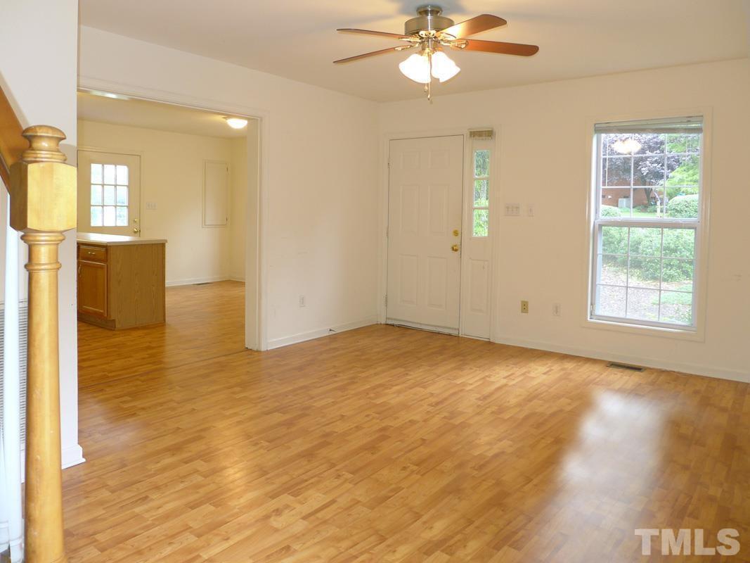 308 Davie Road Carrboro, NC 27510 - Photo 5 of 21 a view of an empty room with a window