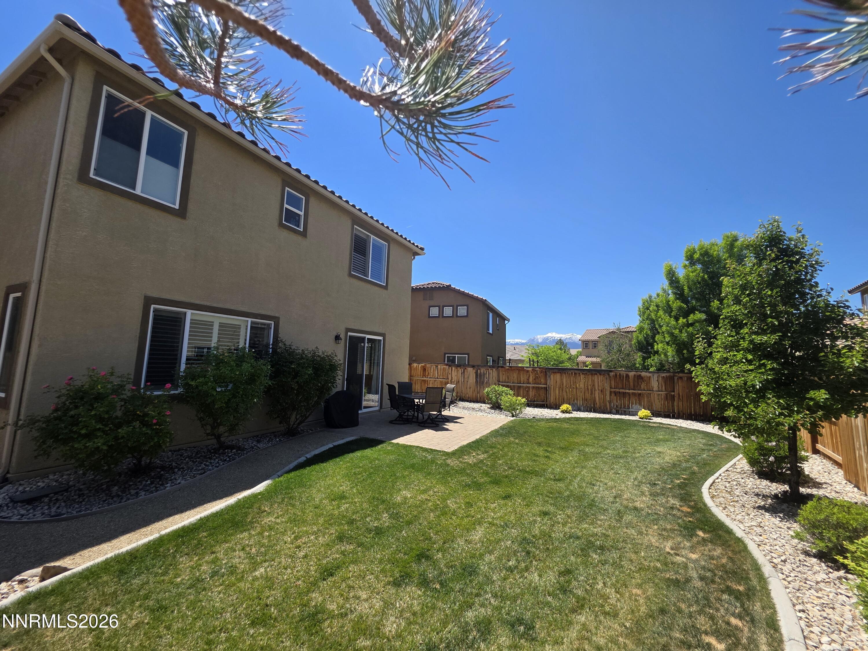 2775 Bonfire Lane Reno, NV 89521 - Photo 4 of 41 a front view of a house with garden