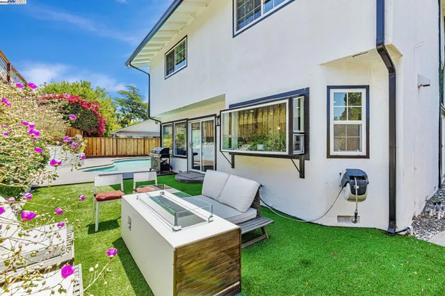 a garden view with a seating space