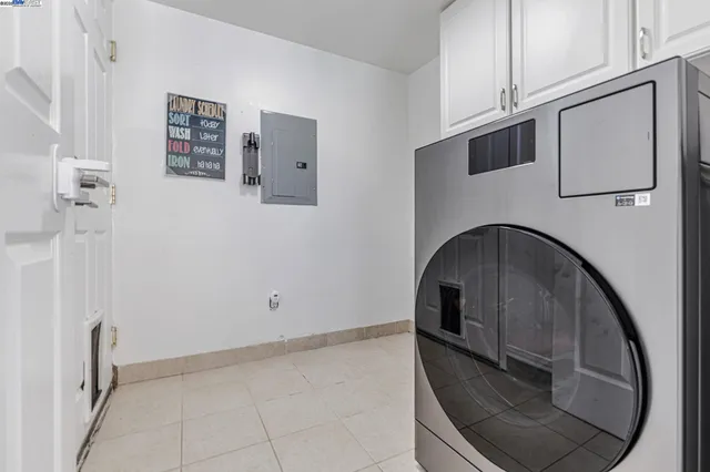 a white bath tub sitting in front of a building