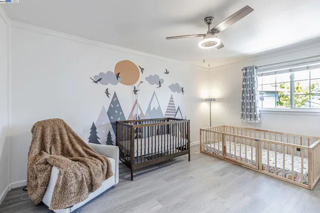 a bedroom with bed room and window