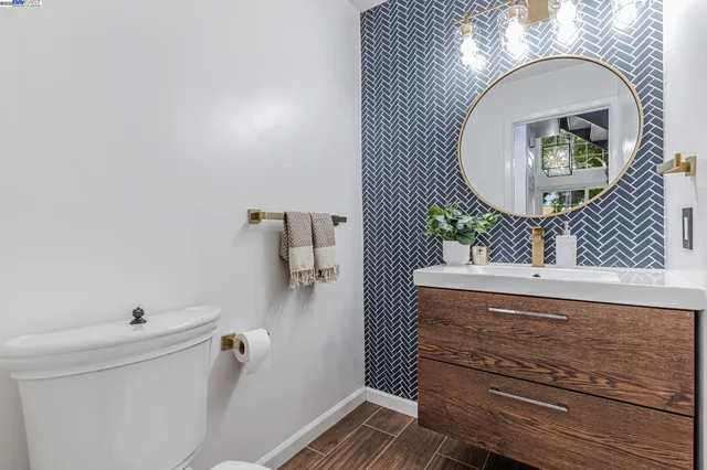 a bathroom with a glass door shower