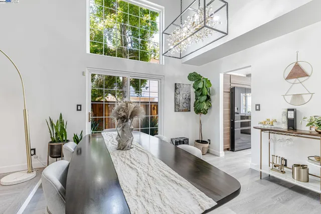 a view of a living room and dining room