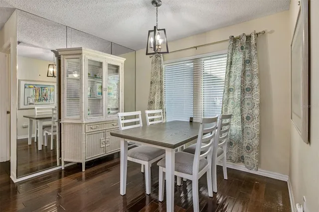a kitchen with stainless steel appliances granite countertop a stove sink microwave and cabinets