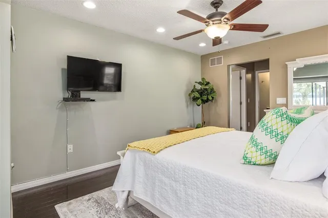 a view of a room with a dry grass