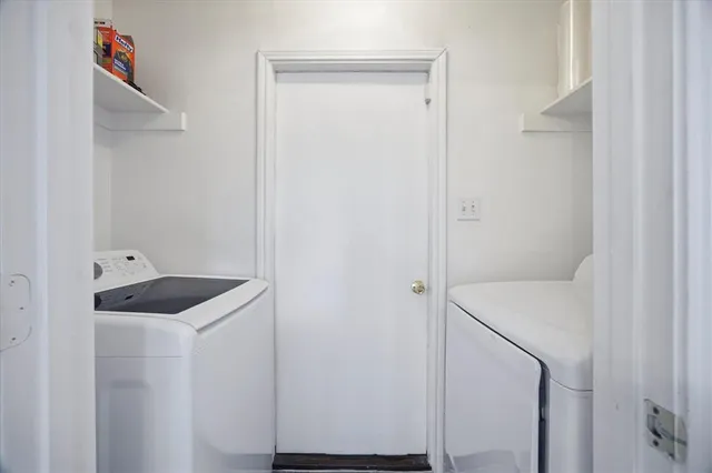 a bathroom with a granite countertop sink and