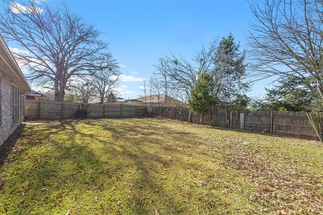 a bathroom with a sink and shower