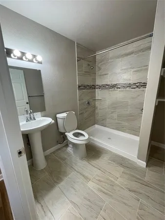 a bathroom with a sink and mirror