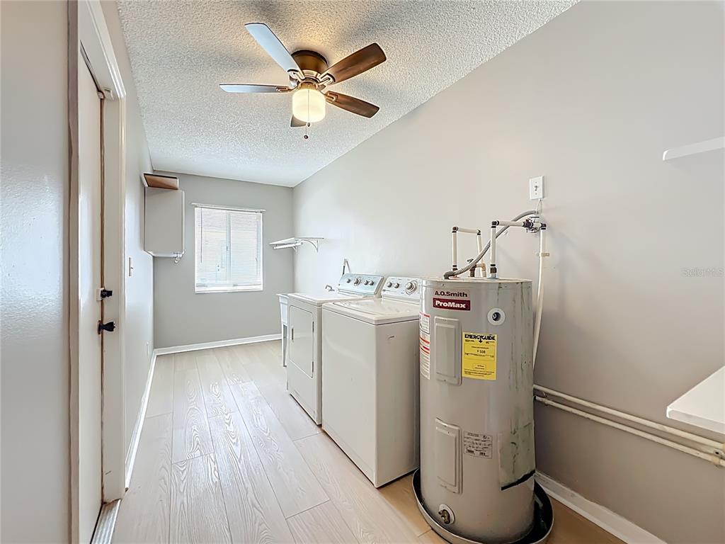 10583 Southwest 62nd Ter Road Ocala, FL 34476 - Photo 33 of 59 a utility room with closet dryer and washer
