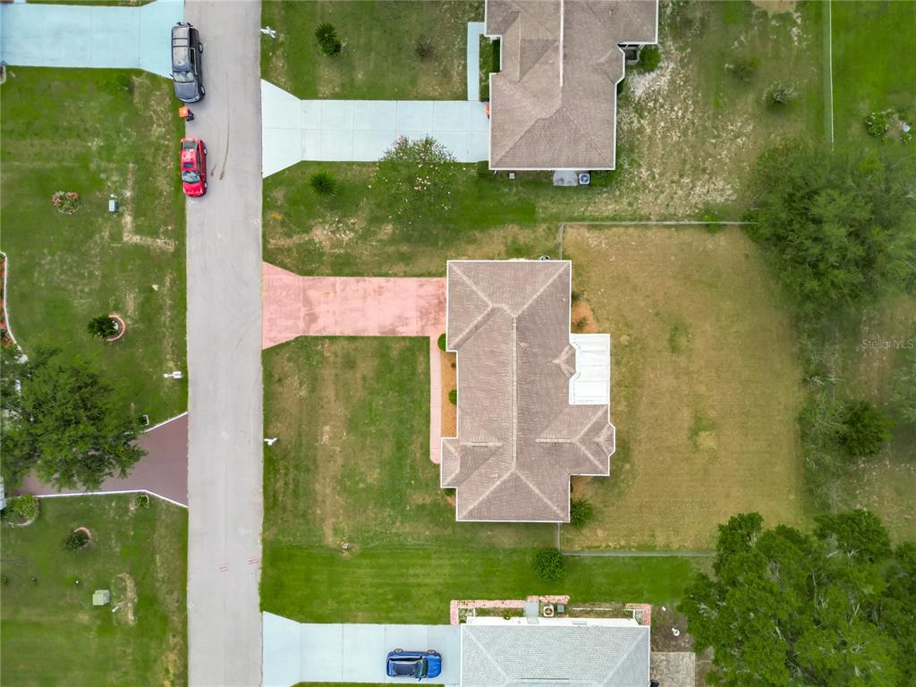 10583 Southwest 62nd Ter Road Ocala, FL 34476 - Photo 45 of 59 an aerial view of a house having yard