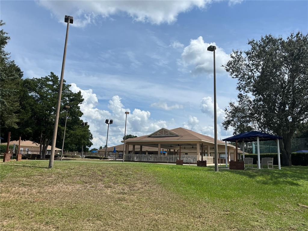10583 Southwest 62nd Ter Road Ocala, FL 34476 - Photo 52 of 59 a view of a house with a backyard