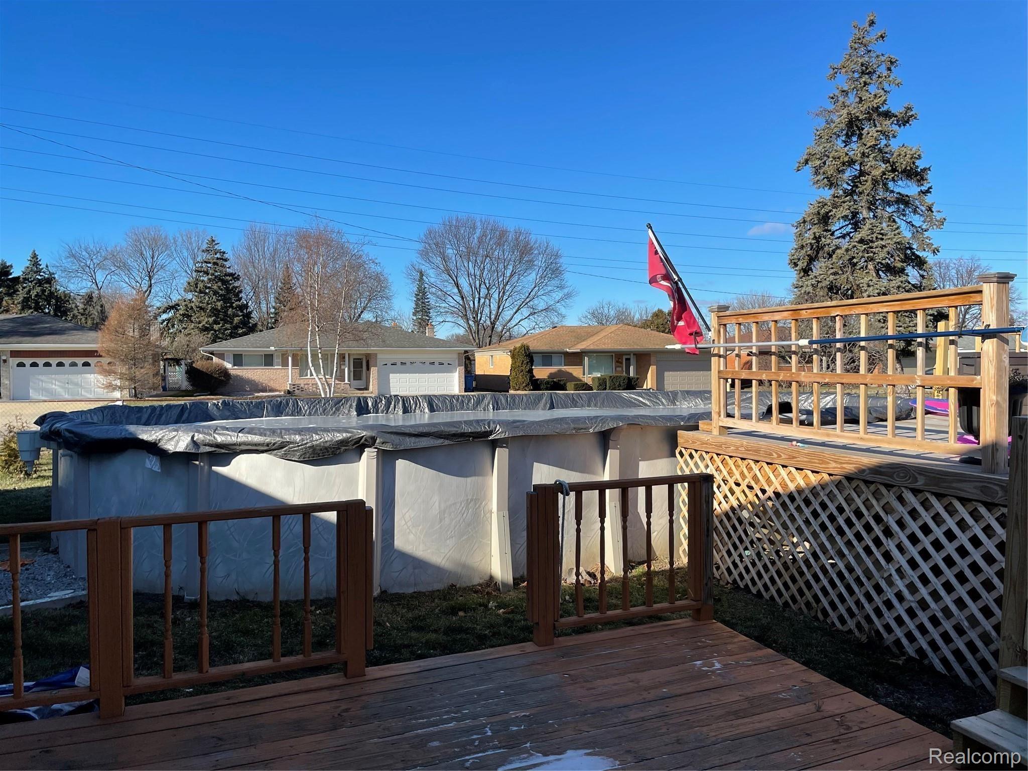 14019 Martin Road Warren, MI 48088 - Photo 25 of 30 Backyard Deck and Pool