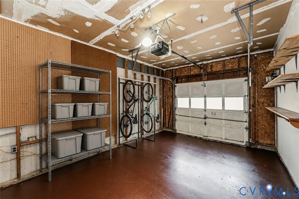 2806 Cove Ridge Road Midlothian, VA 23112 - Photo 40 of 42 Garage space with a single overhead door, equipped