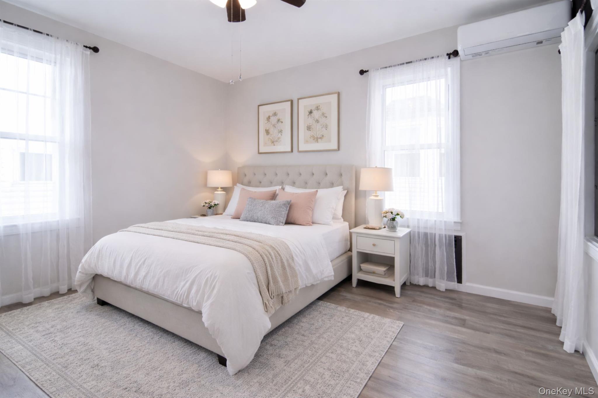 16 Badeau Place New Rochelle, NY 10801 - Photo 14 of 27 a bedroom with a bed and a window