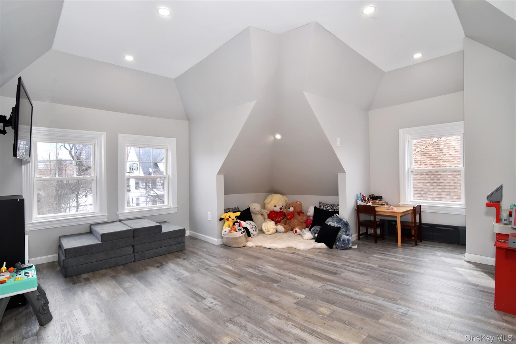 16 Badeau Place New Rochelle, NY 10801 - Photo 10 of 27 a playing room with furniture and a window
