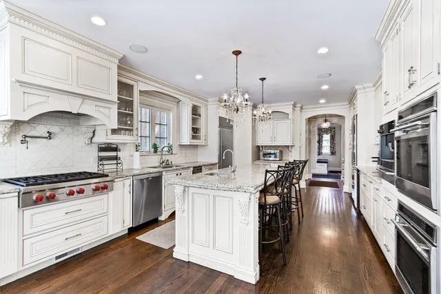 a spacious bedroom with a bed and a fireplace