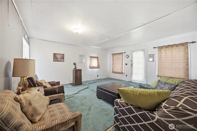 a living room with furniture and a couch