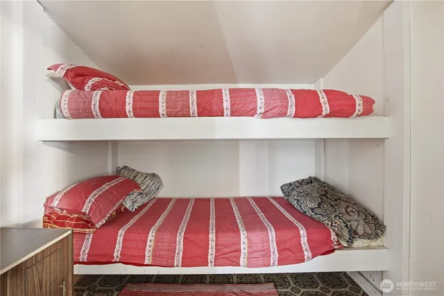 a room with a bed and closet