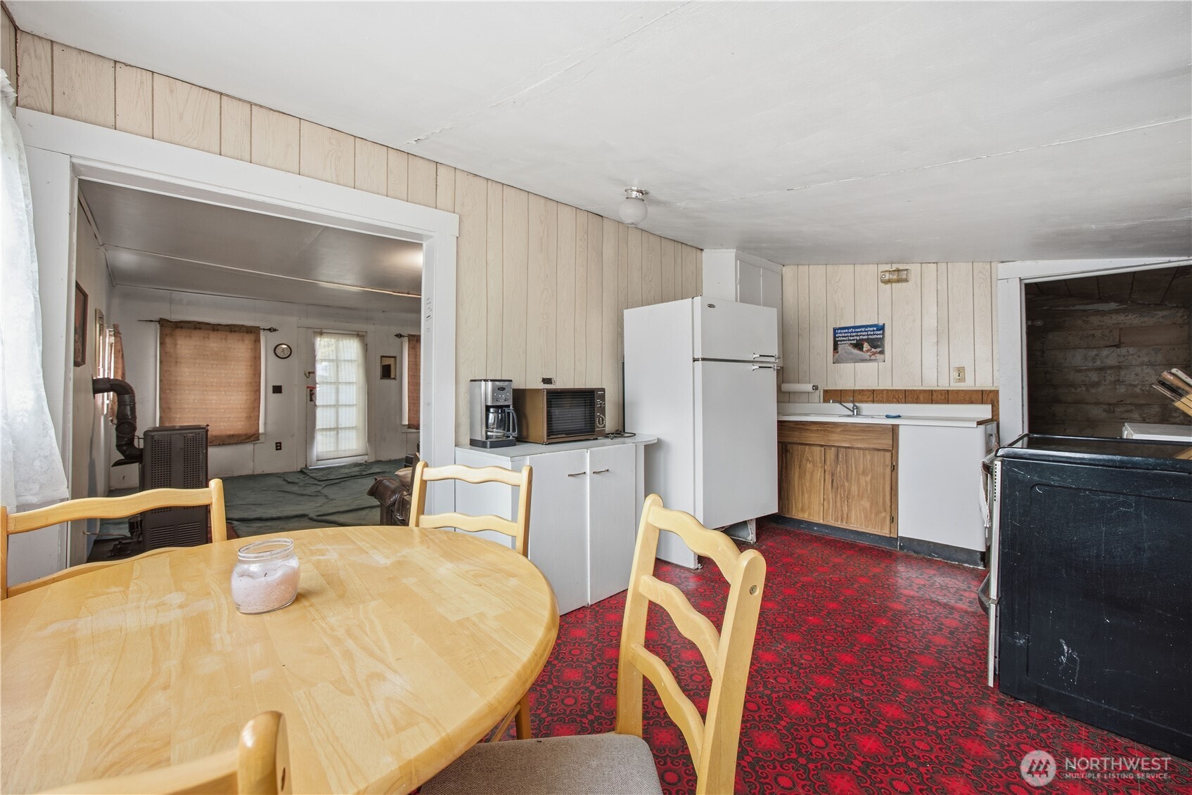 38 A Main Street Methow, WA 98834 - Photo 22 of 34 a room with a bed and furniture