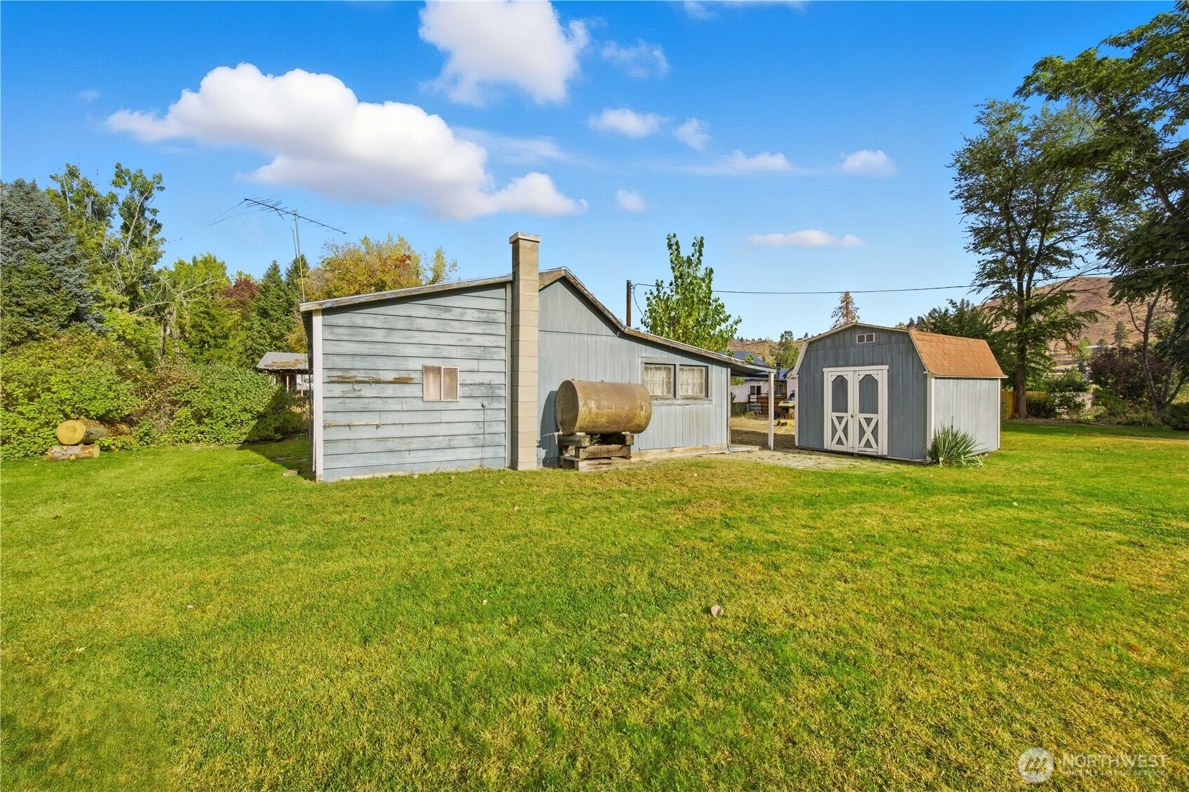 38 A Main Street Methow, WA 98834 - Photo 3 of 34 a house view with a garden space