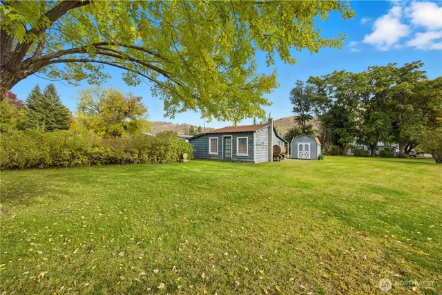 a front view of house with garden