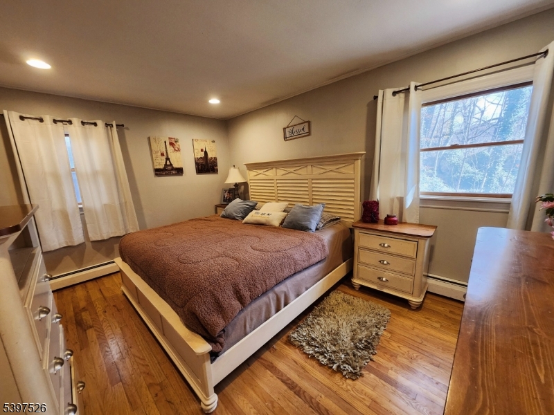 12 Old Coach Road Vernon, NJ 07462 - Photo 11 of 19 a bedroom with a bed and a window