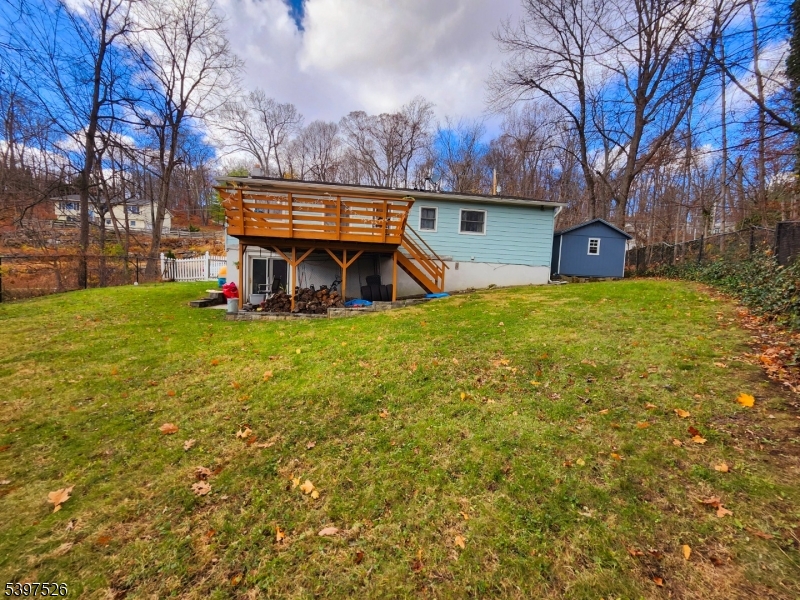 12 Old Coach Road Vernon, NJ 07462 - Photo 16 of 19 a view of a house with a large tree and a yard