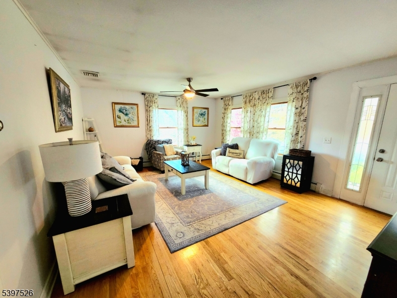 12 Old Coach Road Vernon, NJ 07462 - Photo 4 of 19 a living room with furniture and a window