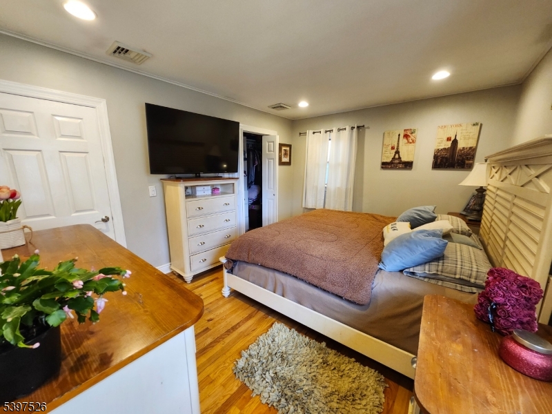 12 Old Coach Road Vernon, NJ 07462 - Photo 10 of 19 a living room with furniture and a flat screen tv