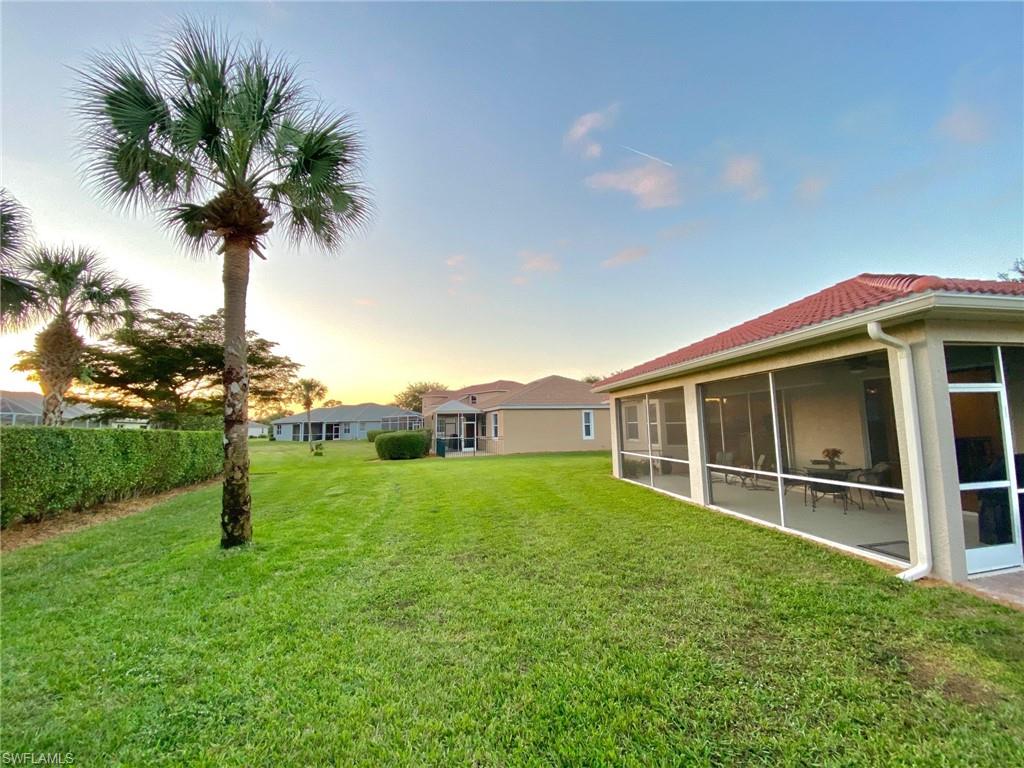 3955 Ruxton Road Naples, FL 34116 - Photo 23 of 23 a house with garden in front of it