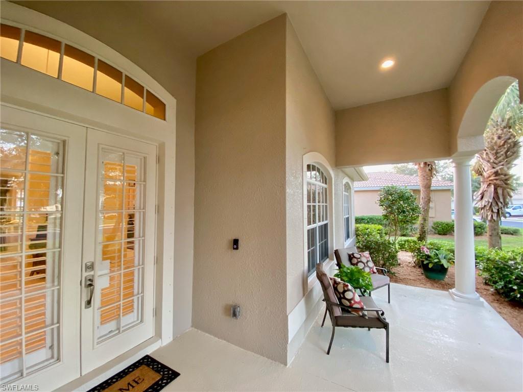 3955 Ruxton Road Naples, FL 34116 - Photo 4 of 23 a outdoor living space with furniture