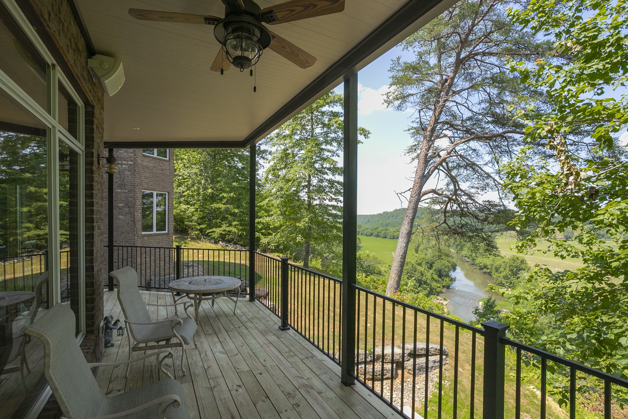 796 Thompson Road Pegram, TN 37143 - Photo 11 of 38 a view of a porch with chairs and backyard