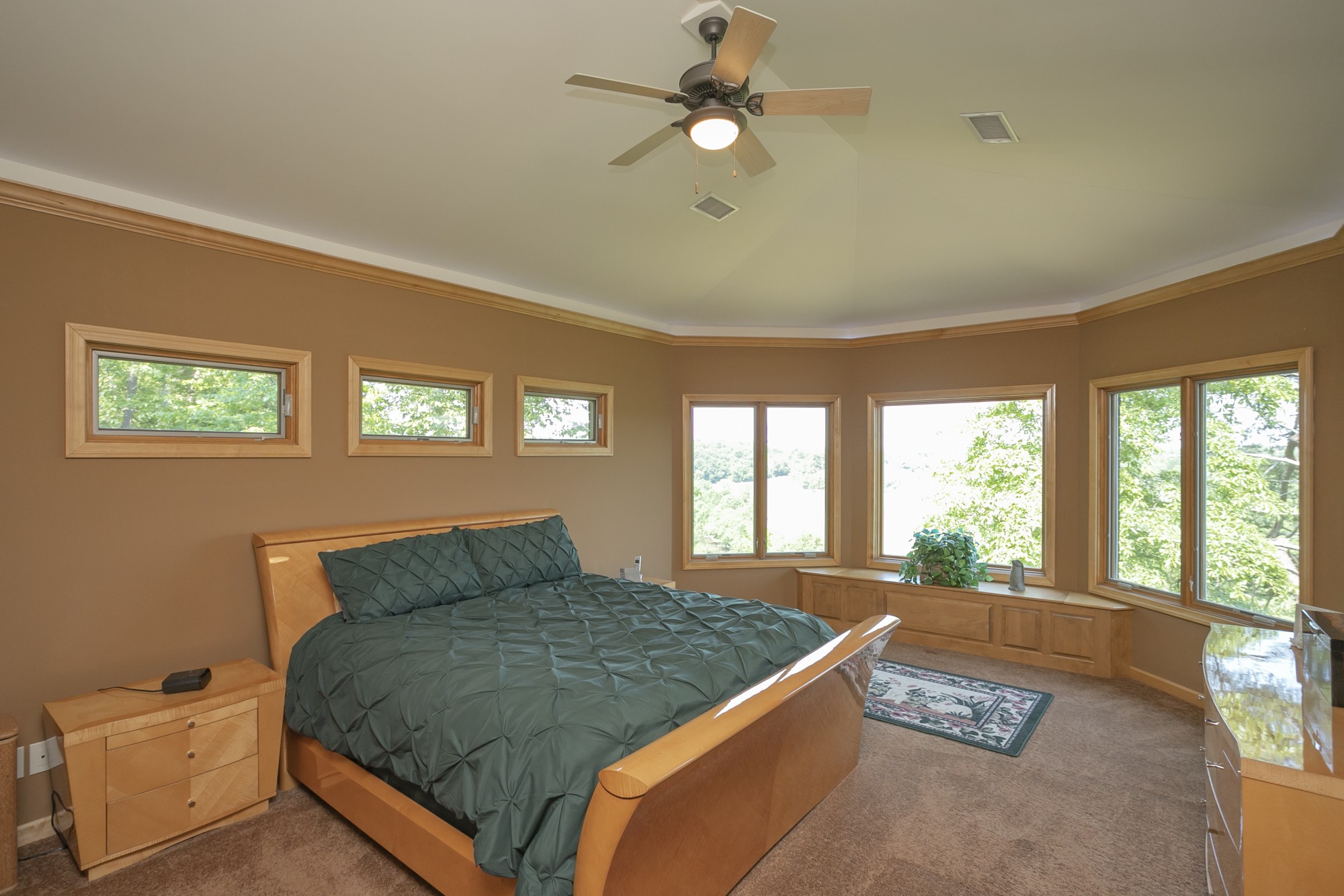 796 Thompson Road Pegram, TN 37143 - Photo 15 of 38 a bedroom with a large bed and a couch