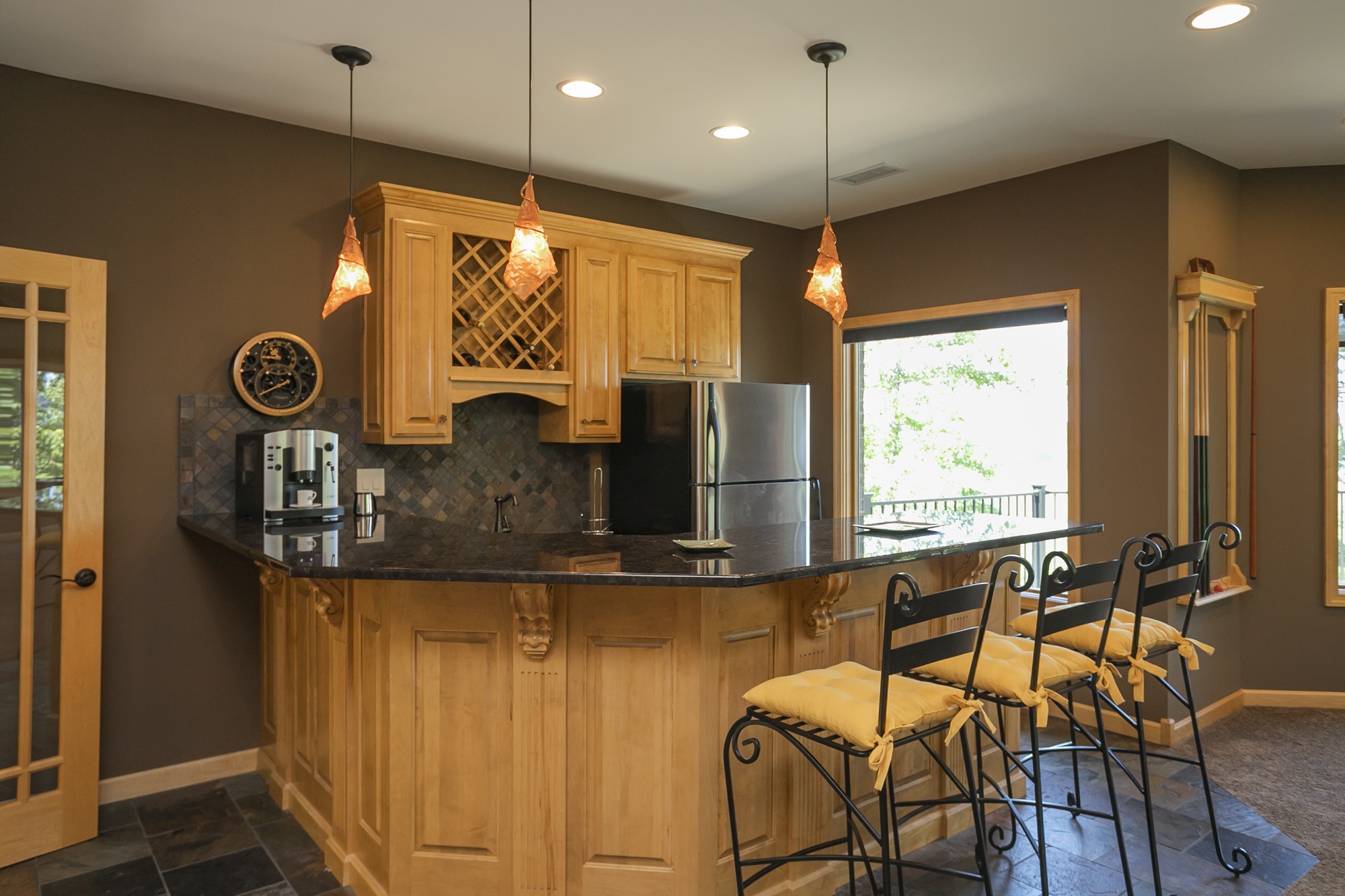 796 Thompson Road Pegram, TN 37143 - Photo 21 of 38 a kitchen with stainless steel appliances granite countertop a stove and a refrigerator