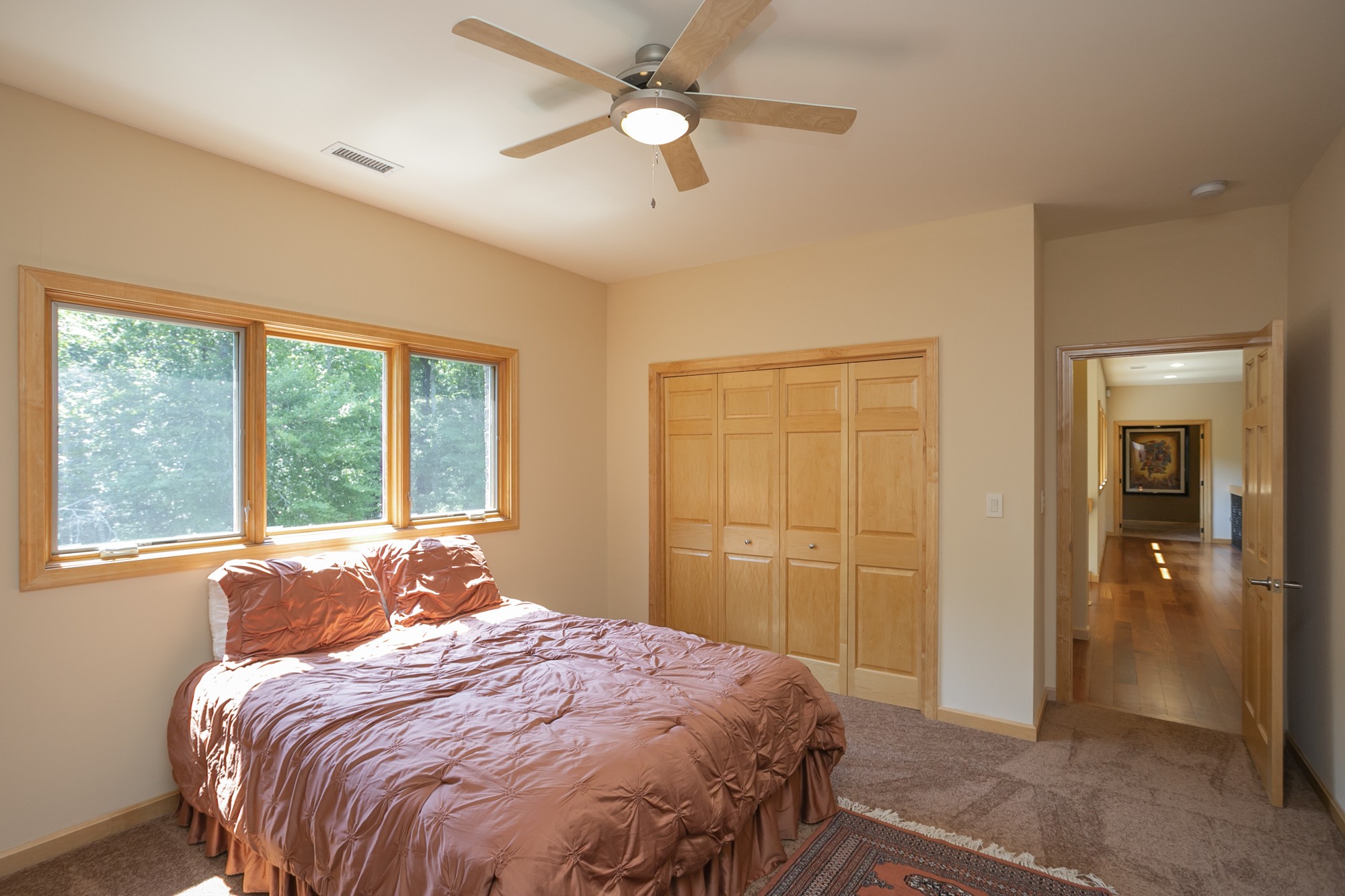 796 Thompson Road Pegram, TN 37143 - Photo 23 of 38 a bedroom with a bed and a large window