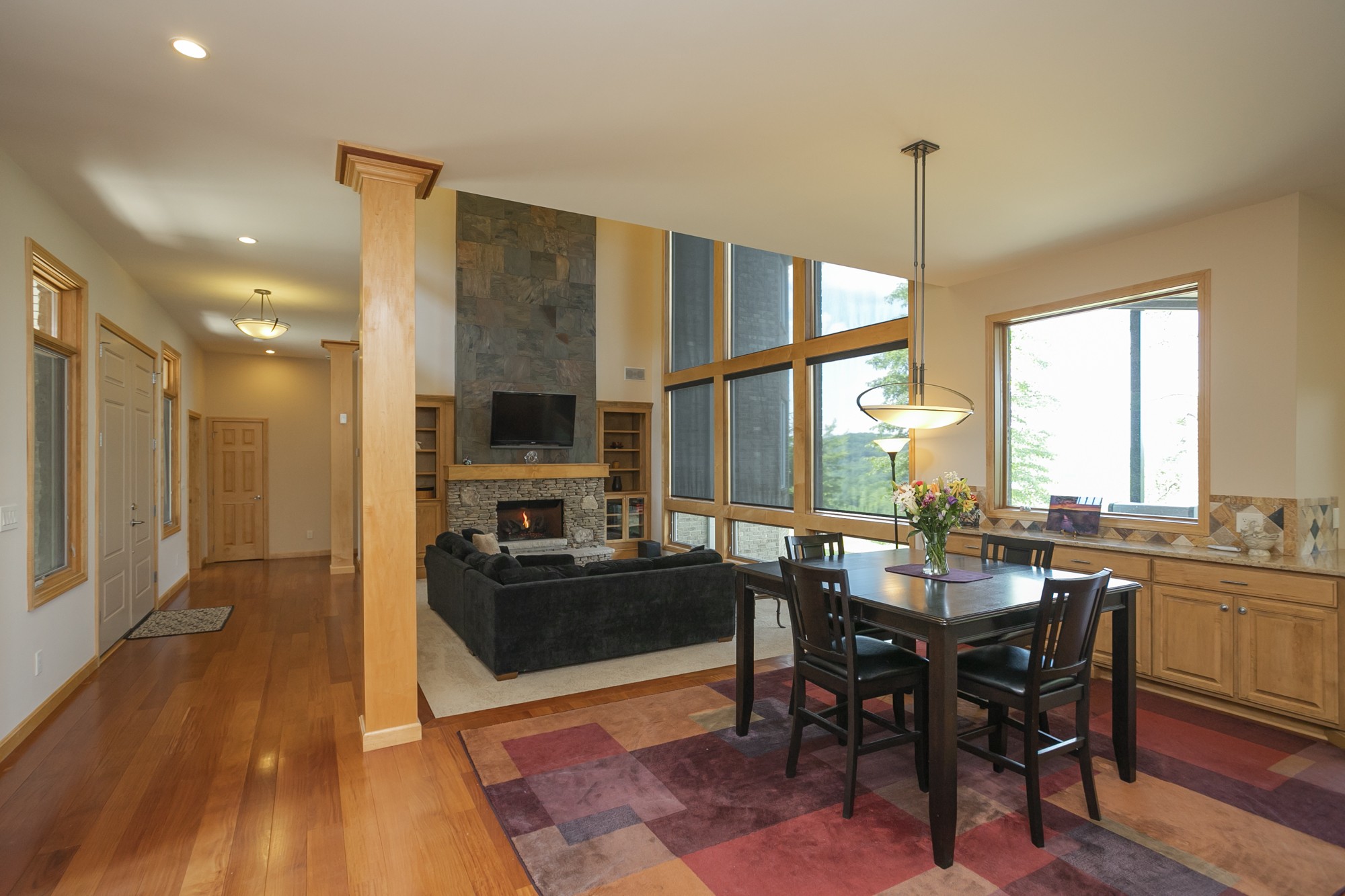 796 Thompson Road Pegram, TN 37143 - Photo 9 of 38 a view of a dining room with furniture window and wooden floor
