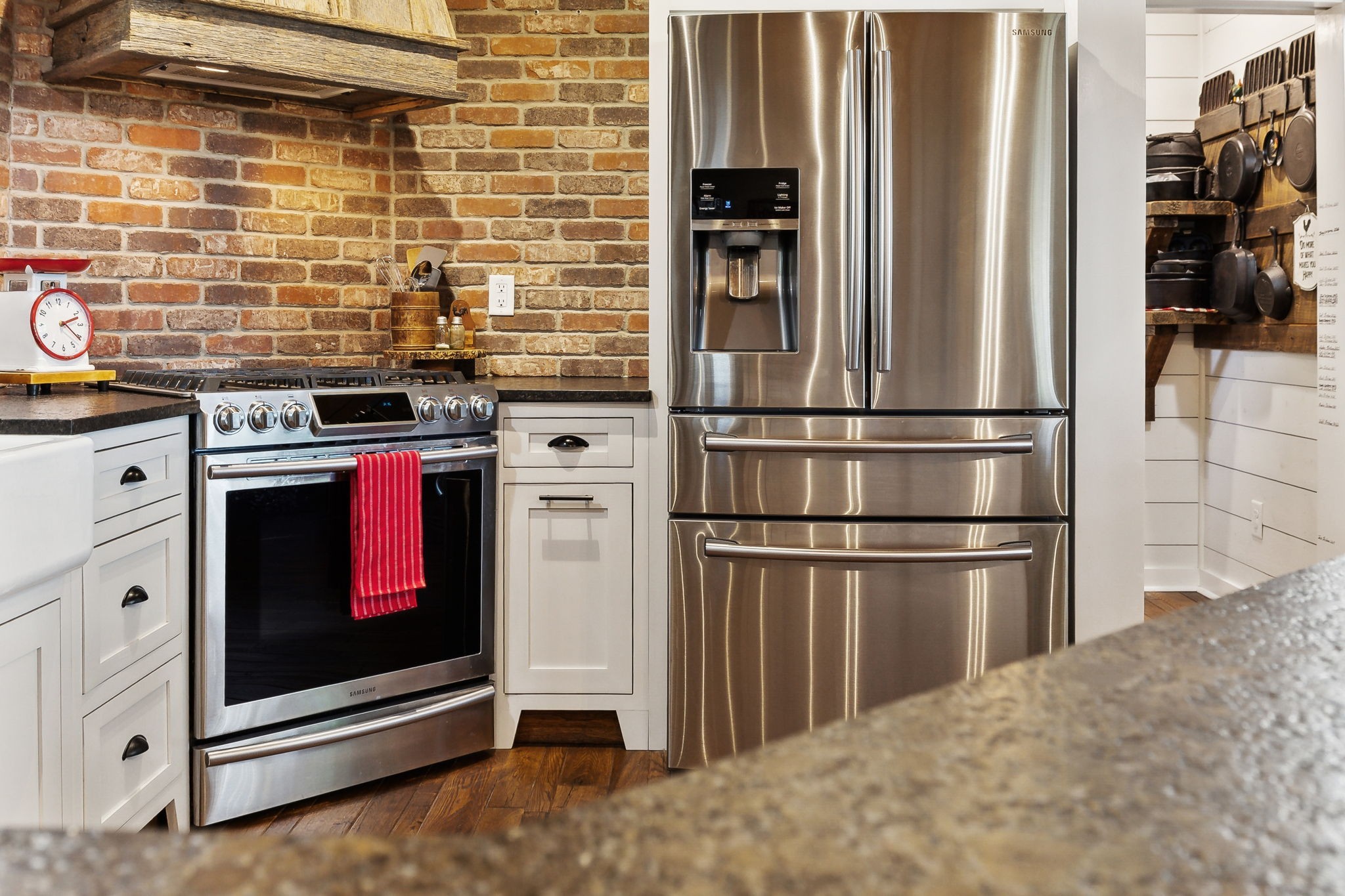 1606 Nosegay Road White Bluff, TN 37187 - Photo 23 of 88 a kitchen with stainless steel appliances granite countertop a refrigerator and a stove