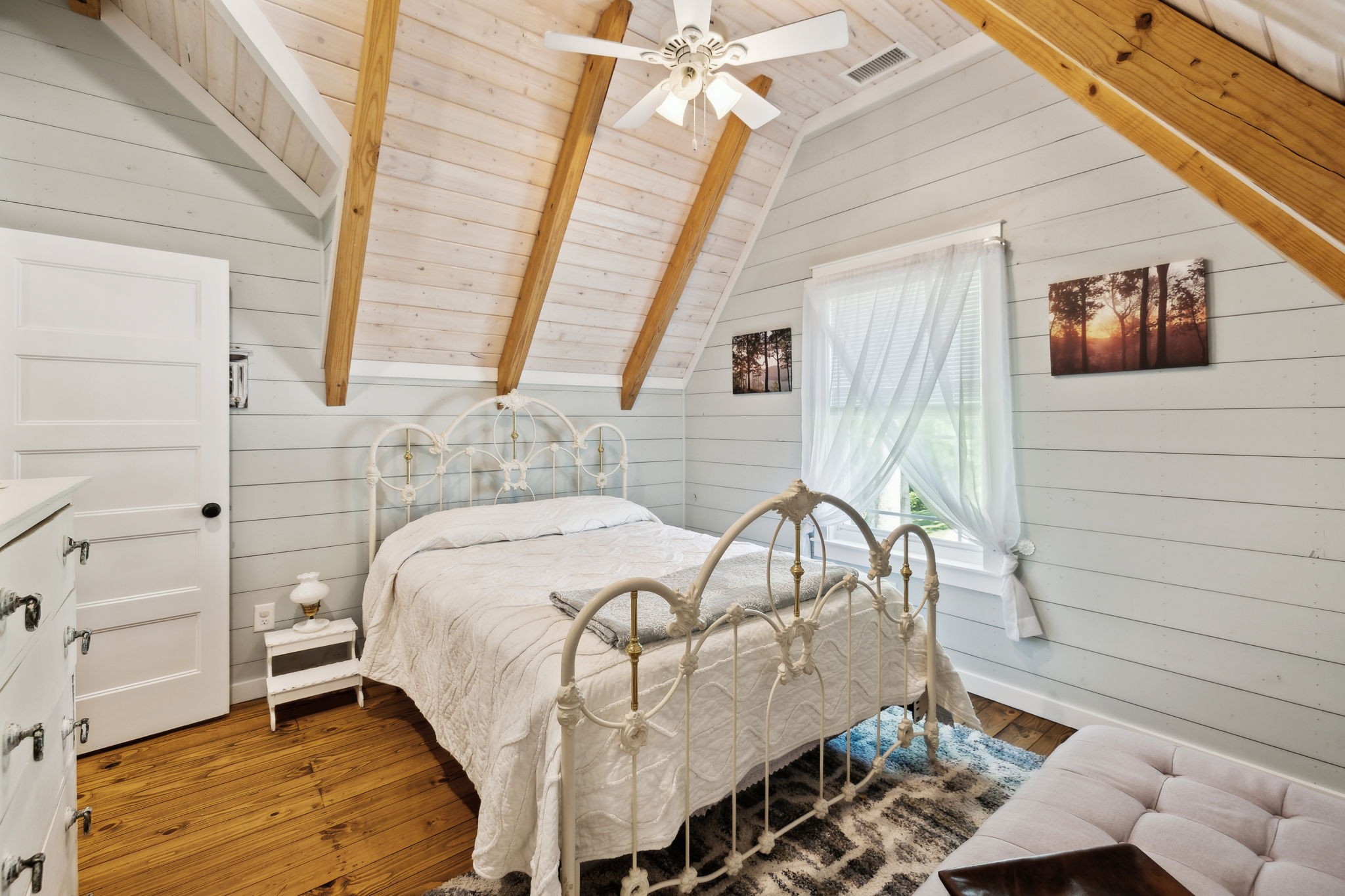 1606 Nosegay Road White Bluff, TN 37187 - Photo 59 of 88 a bed sitting in a room next to a window