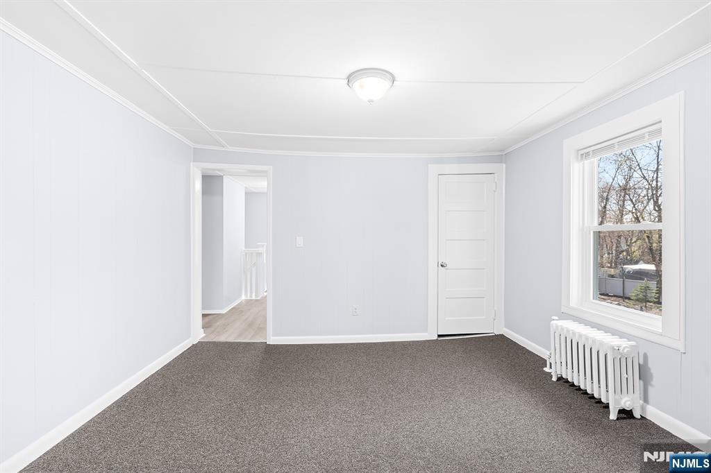 140 Park Avenue, Unit 2 Park Ridge, NJ 07656 - Photo 11 of 19 a view of a livingroom with a hard wood floor